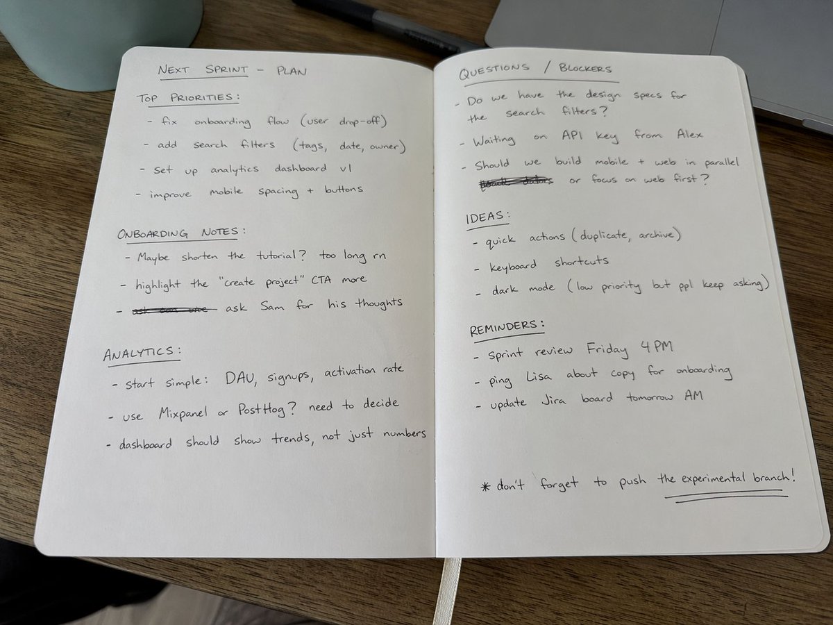 Handwritten Black Ballpoint Notes on a Desk